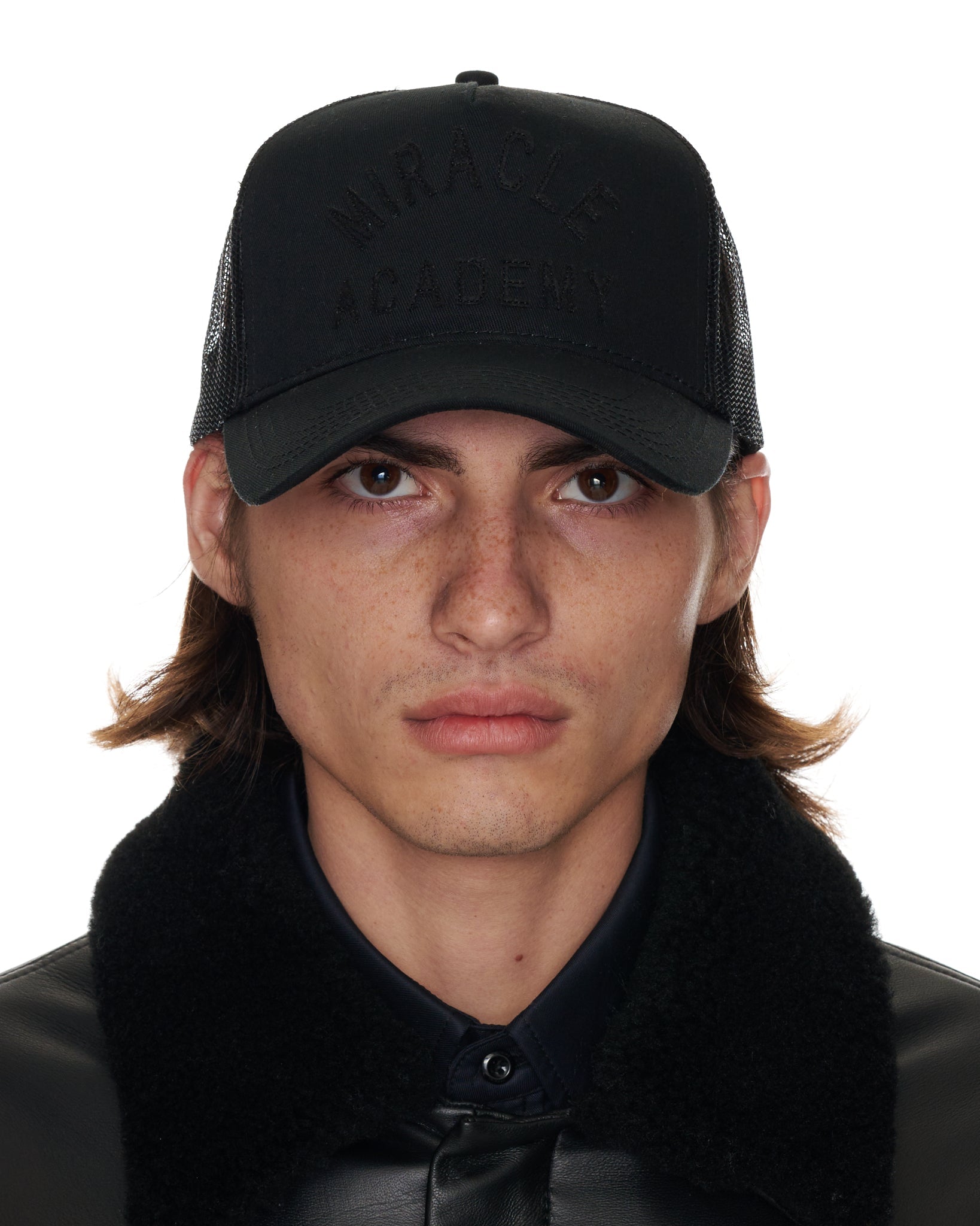 Miracle Academy Trucker Hat in Black on Black
