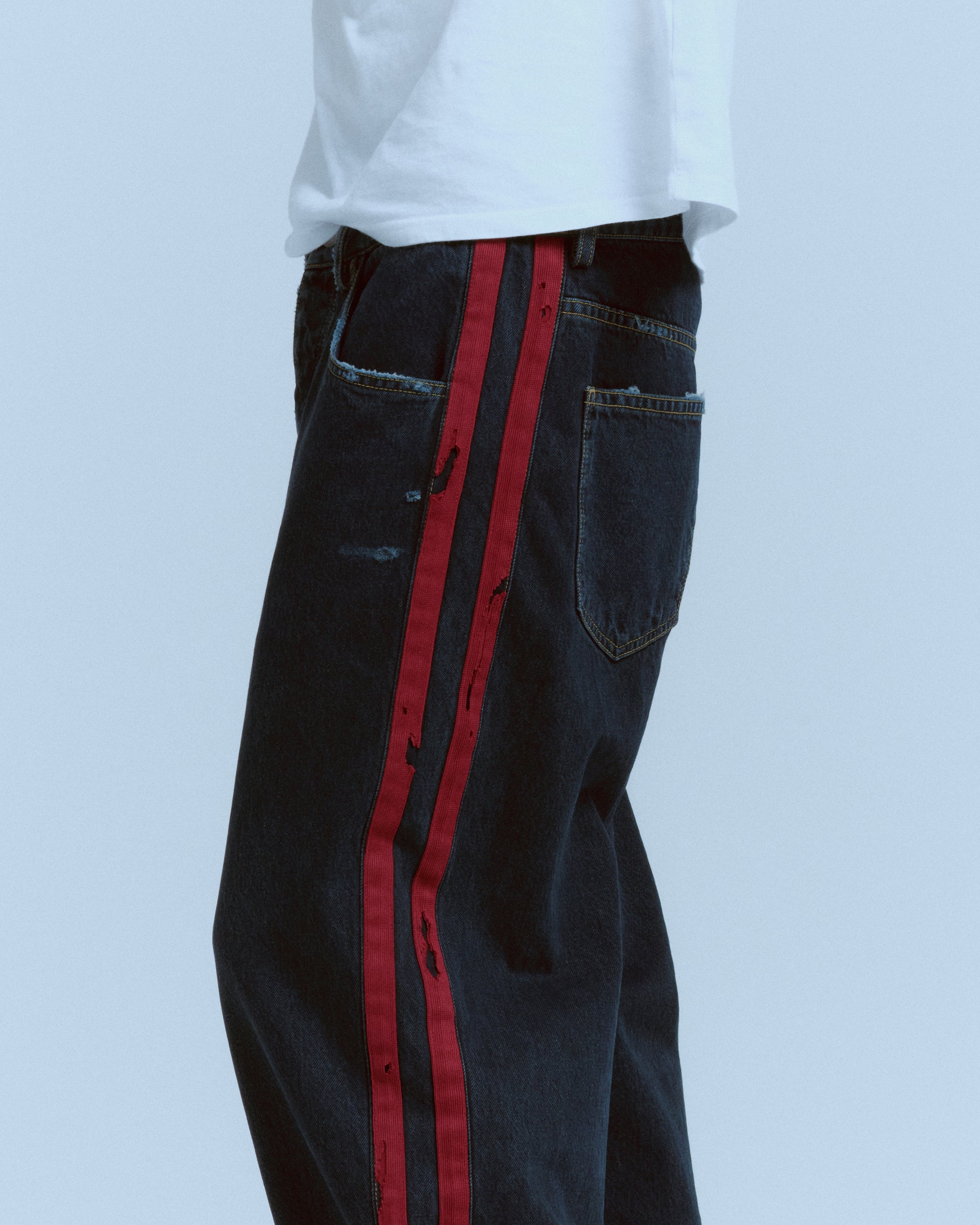 DESTROYED DENIM TRACK PANT