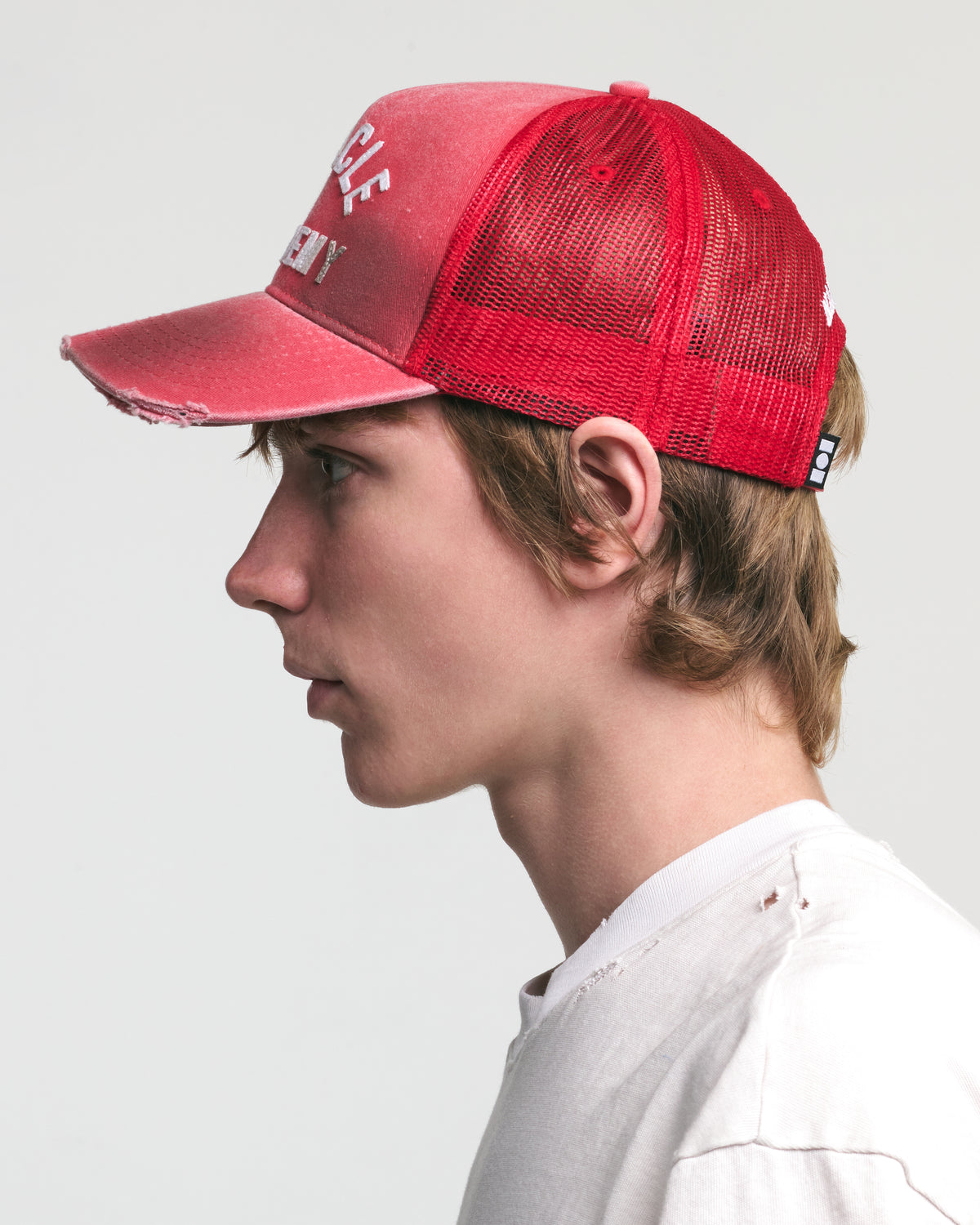DISTRESSED MIRACLE ACADEMY TRUCKER HAT