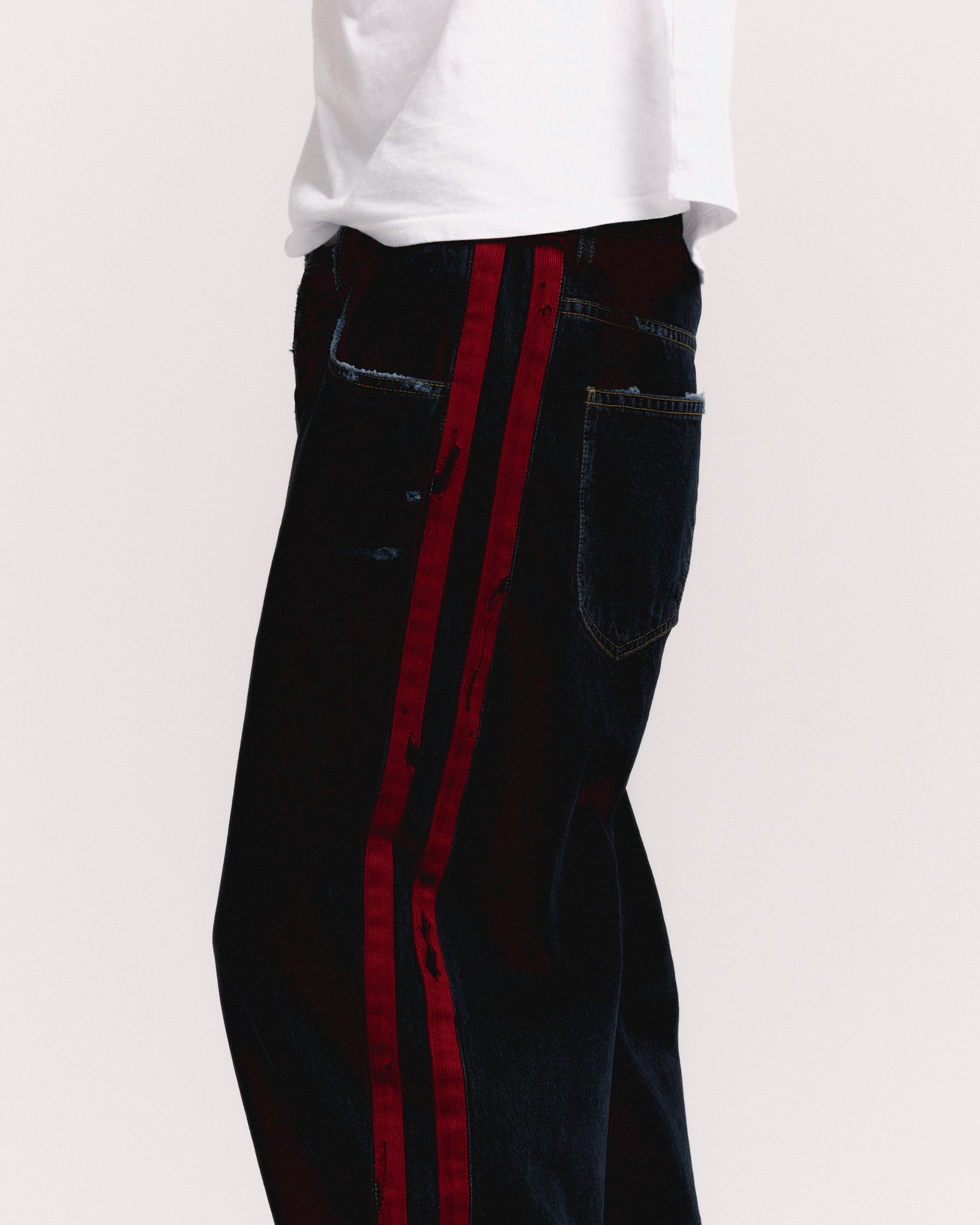 DESTROYED DENIM TRACK PANT