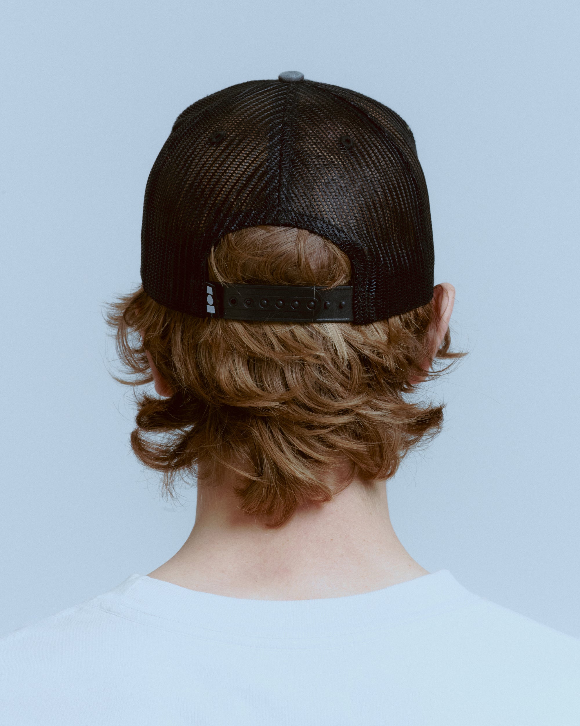 YOUTH ENRICHMENT WASHED TRUCKER HAT
