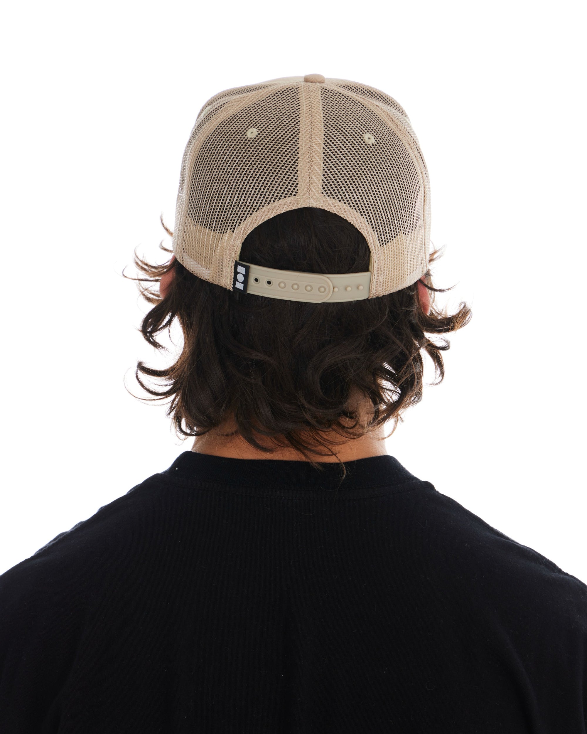 Miracle Academy Trucker Hat in Sand